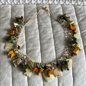 Green and Yellow Eclectic Necklace with Nature-Inspired Charms